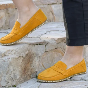 Made from premium yellow color suede leather, these barefoot penny loafers offer a soft, breathable feel and a sophisticated aesthetic suitable for both casual and smart-casual wear.