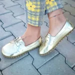 Handcrafted from premium gold-tone genuine leather, these moccasins combine a minimalist barefoot